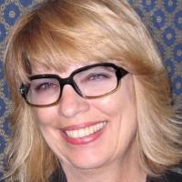 Woman smiles at camera